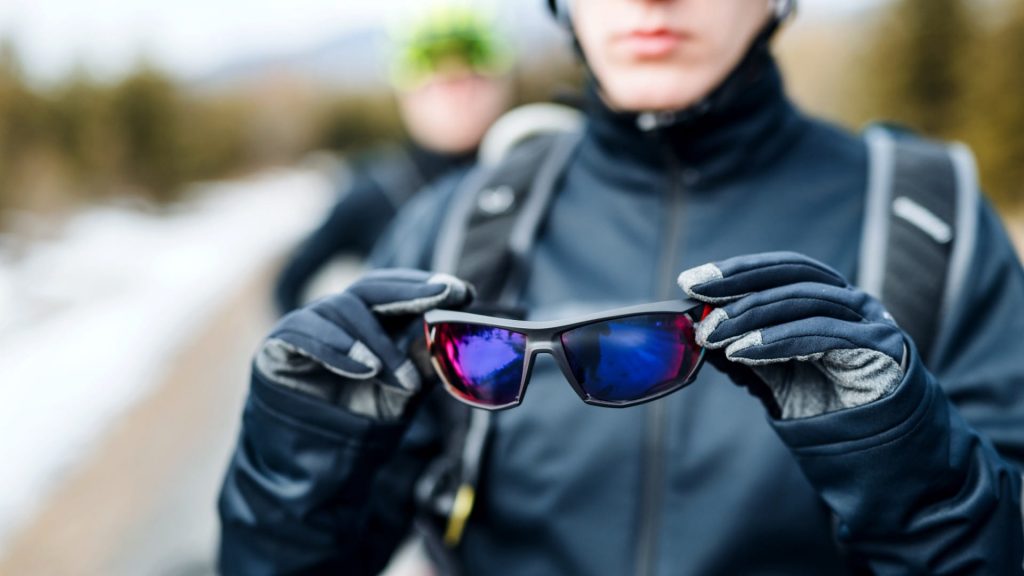 mountain biking gear for beginners: mountain biker with a pair of sunglasses