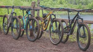 pros and cons of hardtail vs full suspension mountain bikes
