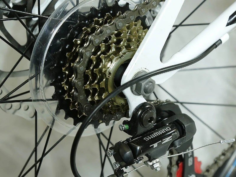 Xspec mountain bike Shimano rear derailleurs and cassette.